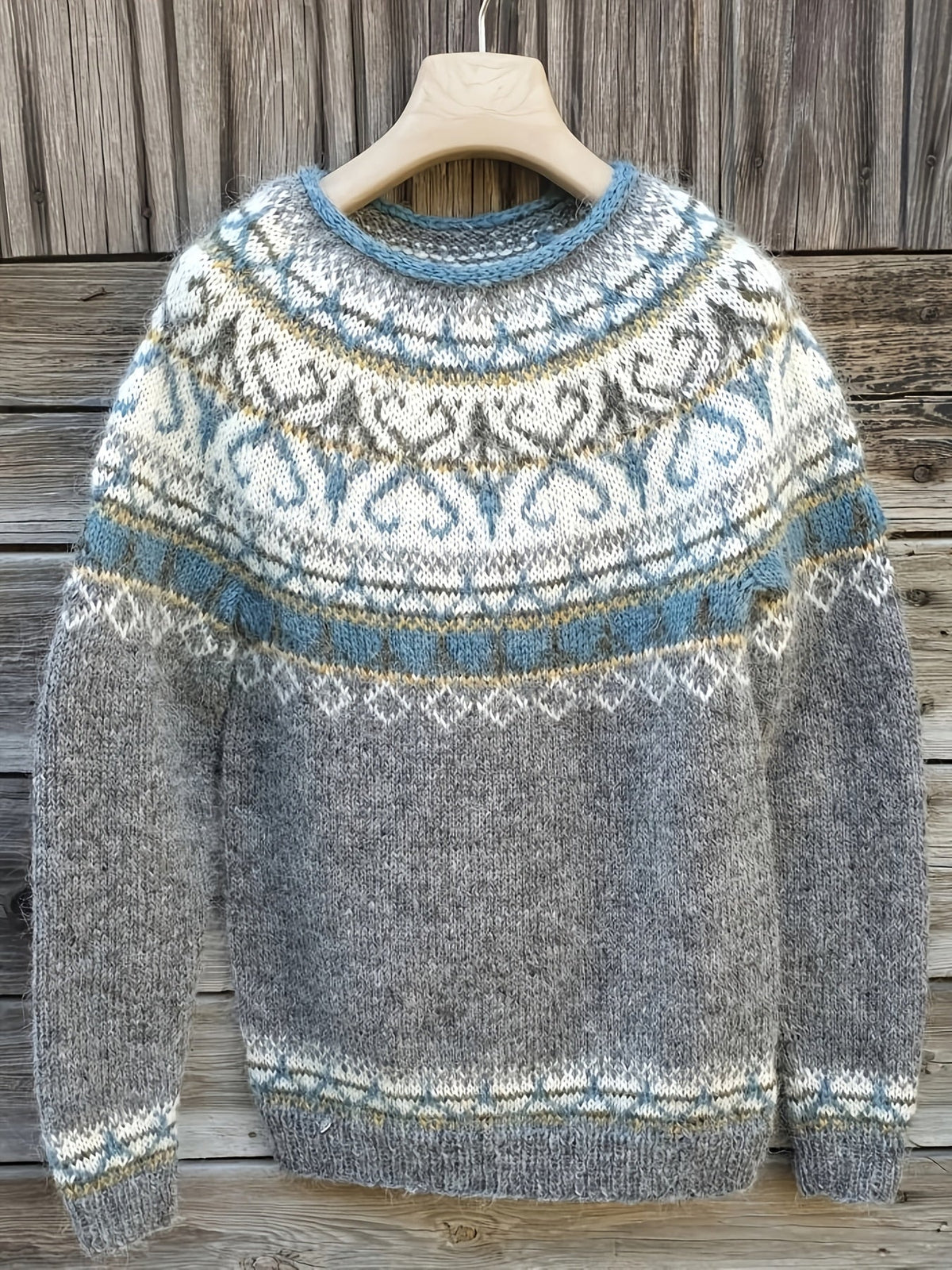Fair Isle Nordic sweater for women by Christine Brewer featuring intricate winter patterns and cozy knit fabric.