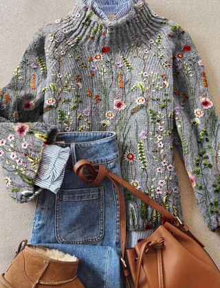 Women's floral ribbed sweater by Christine Brewer, featuring a cozy fit and vibrant floral pattern in soft knit fabric.