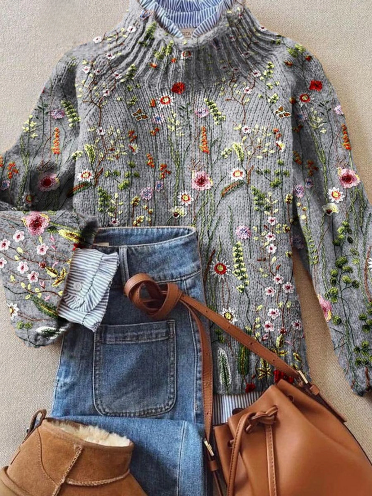 Women's floral ribbed sweater by Christine Brewer, featuring a cozy fit and vibrant floral pattern in soft knit fabric.