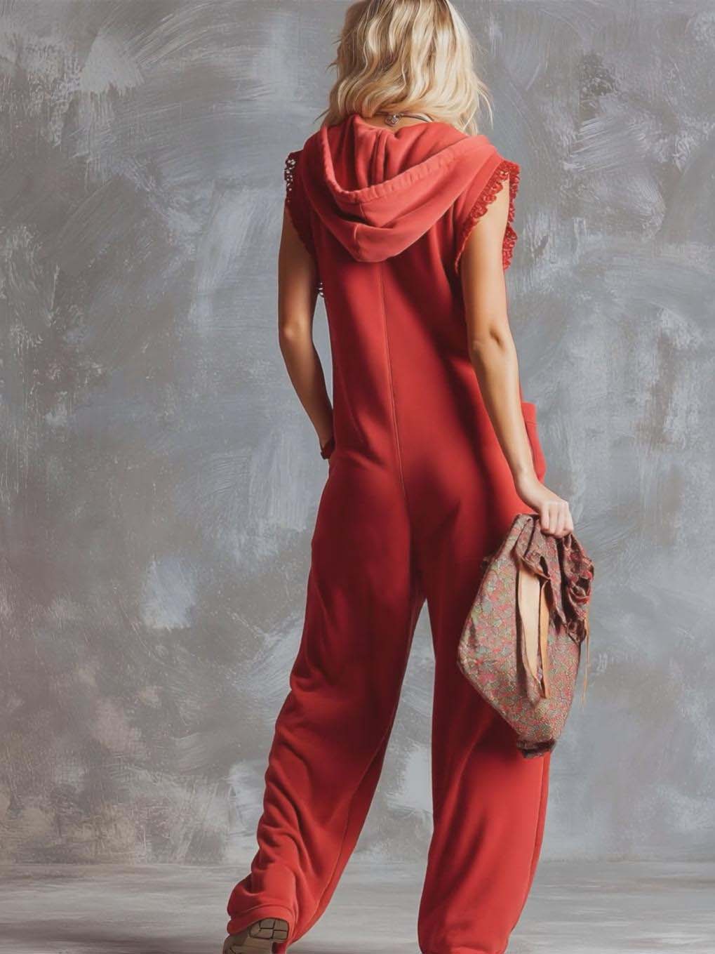Raspberry red cotton hooded zip-front jumpsuit for women with long sleeves and pockets, by Christine Brewer.