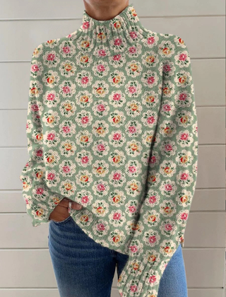 Angela floral graphic sweater for women by Christine Brewer, featuring colorful flower patterns and cozy knit fabric.