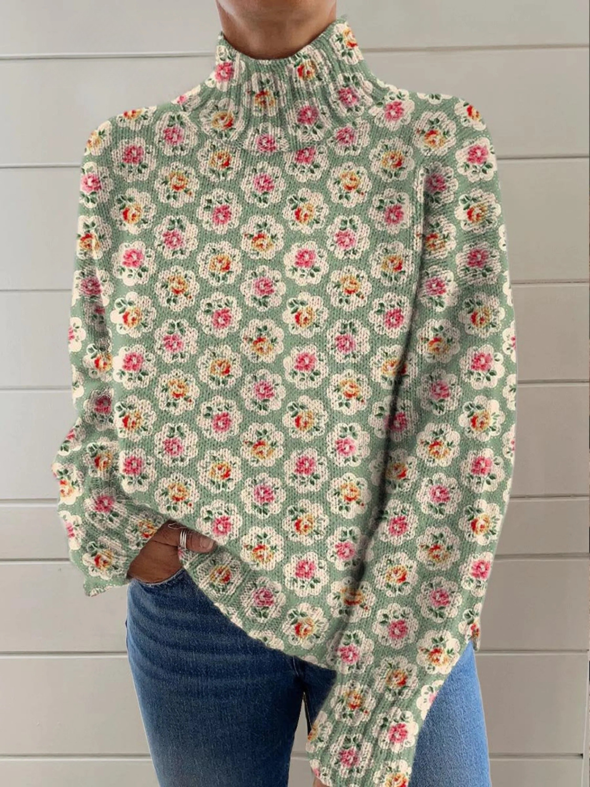 Angela floral graphic sweater for women by Christine Brewer, featuring colorful flower patterns and cozy knit fabric.