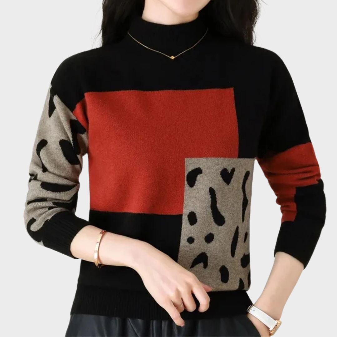 Leopard print graphic sweater for women by Christine Brewer, featuring a cozy knit design and stylish animal print pattern.