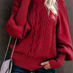 Mila cable knit high neck sweater for women by Christine Brewer, featuring a cozy, textured knit design and high neckline.