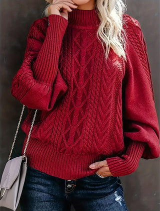 Mila cable knit high neck sweater for women by Christine Brewer, featuring a cozy, textured knit design and high neckline.