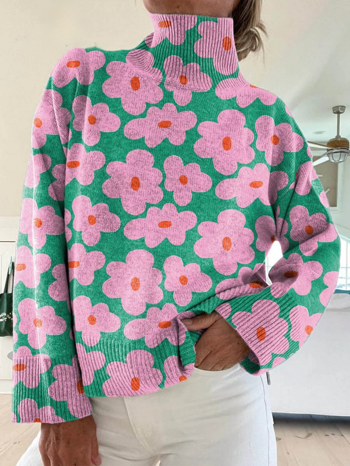 Gianna floral ribbed sweater for women by Christine Brewer, featuring a colorful floral pattern and cozy ribbed knit texture.