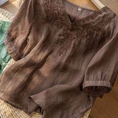 Flowy summer V-neck linen blouse for women by Christine Brewer, casual and stylish top perfect for warm weather.