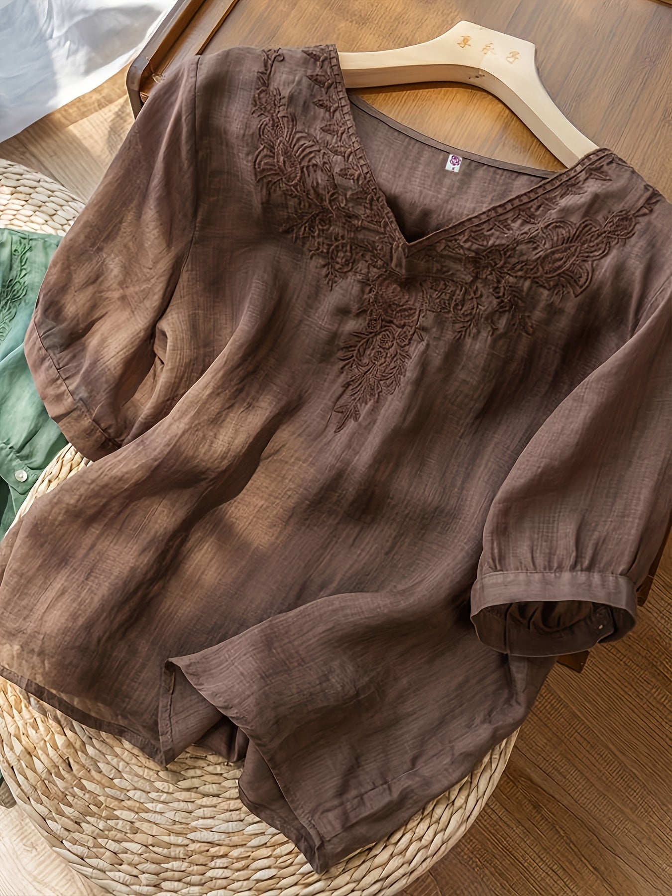 Flowy summer V-neck linen blouse for women by Christine Brewer, casual and stylish top perfect for warm weather.