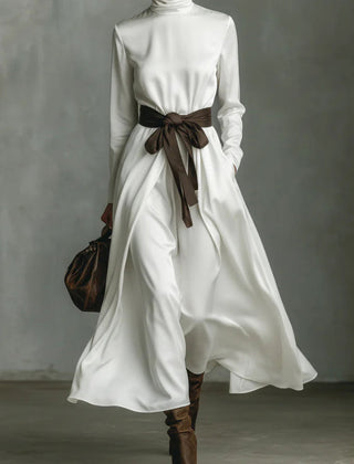 Color-blocked belted high-neck long-sleeve maxi dress by Christine Brewer, casual style with vibrant color accents and a flowing silhouette.
