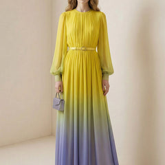 Christine Brewer high-waisted long sleeve maxi dress with belt, contrast color gradient, pleated design, split joint, and round neck.
