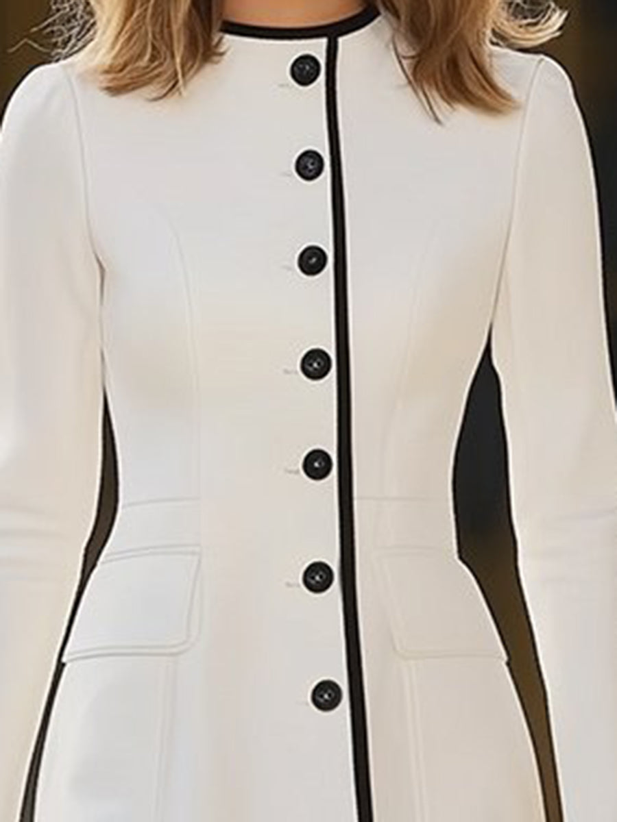 Women’s dress by Christine Brewer featuring a stylish, flowy design with a fitted waist and elegant neckline.