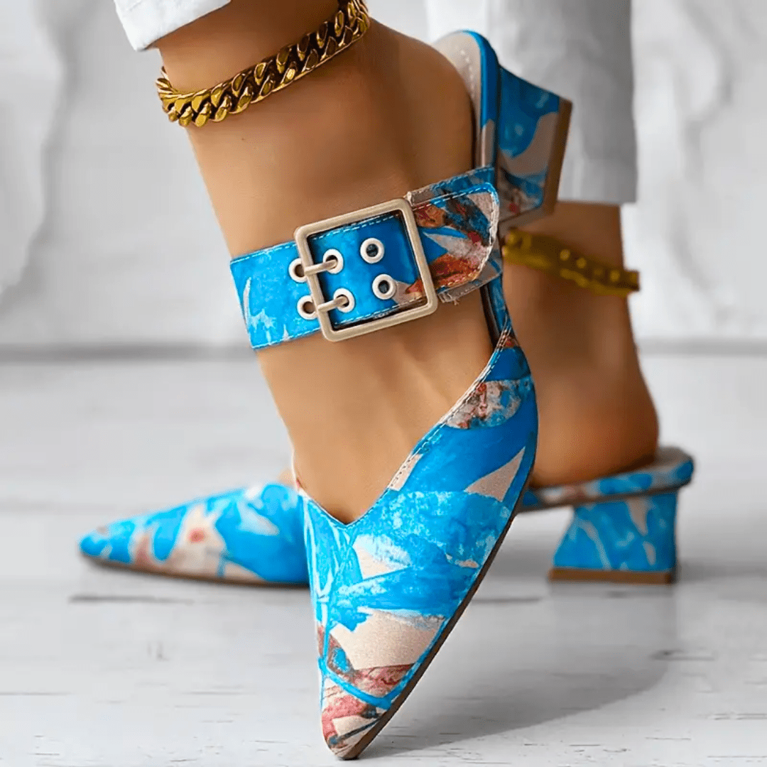 Bright rainbow-colored women's orthopedic heels by Christine Brewer with comfortable, stylish design and supportive sole.