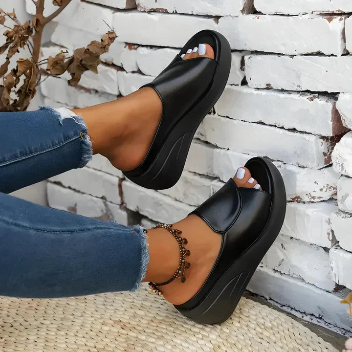 Comfortable Christine Brewer Eliza orthopedic slip-on wedge sandals for women, featuring supportive design and casual style.