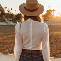 White lace Western button-down shirt for women by Christine Brewer, featuring intricate lace details and classic Western design.