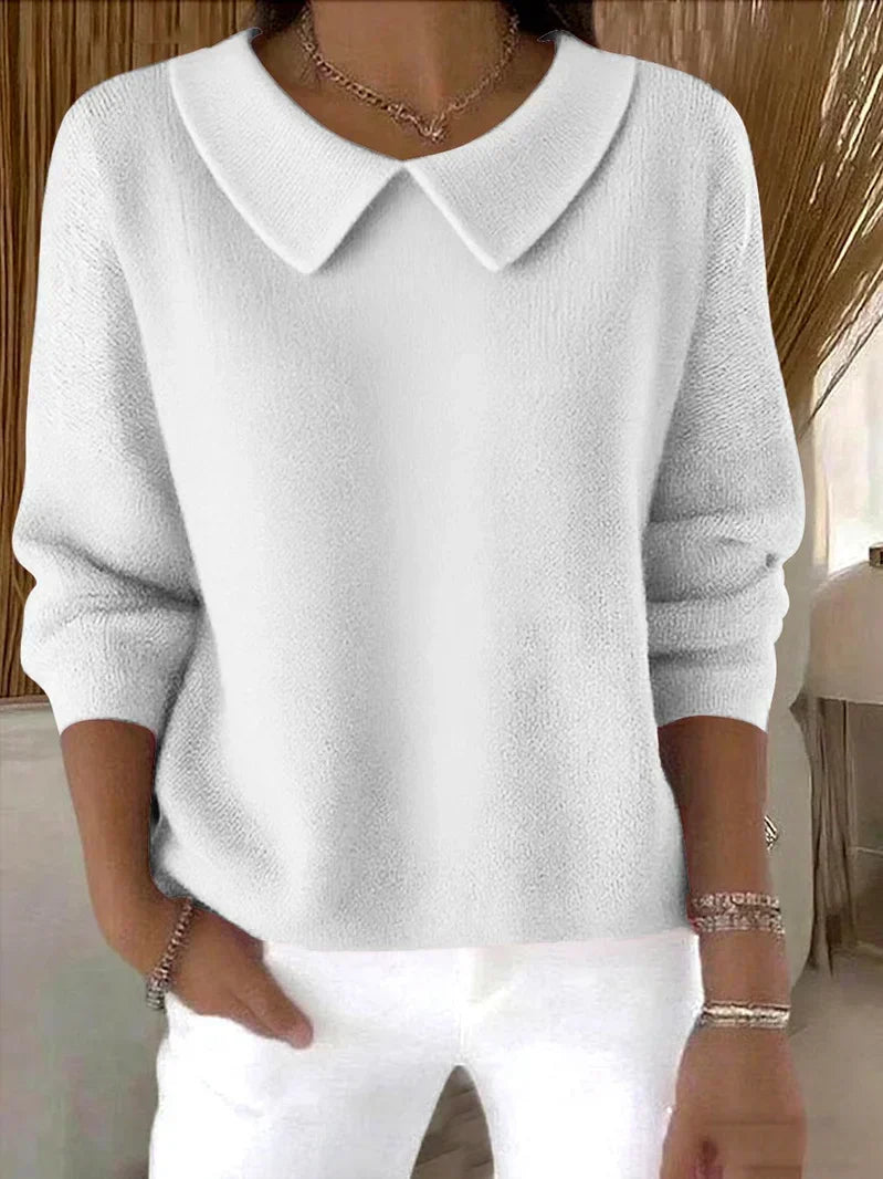 Christine Brewer Clara relaxed fit sweater in versatile classic style, shown in a cozy, neutral-colored knit on a model.