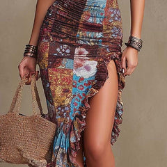 Floral midi dress by Christine Brewer featuring a casual style with vibrant flower patterns and a flowing silhouette.