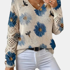 Christine Brewer Jocelyn knit cardigan for women, soft fabric, button-up design, in a cozy, neutral color, displayed on a hanger.