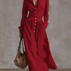 Christine Brewer high waisted maxi dress with long sleeves, buttoned pleated pockets, split-joint lapel in solid color.