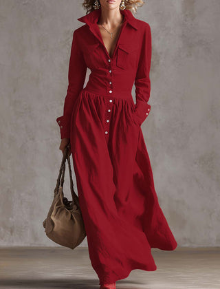 Christine Brewer high waisted maxi dress with long sleeves, buttoned pleated pockets, split-joint lapel in solid color.