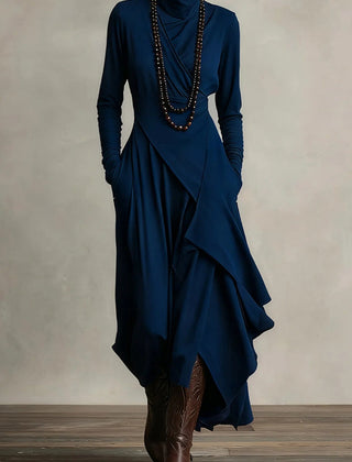Solid color high-neck long-sleeved casual maxi dress by Christine Brewer, featuring an irregular hem and relaxed fit.