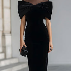 Black velvet bow midi dress for women by Christine Brewer, featuring a fitted silhouette and elegant design.