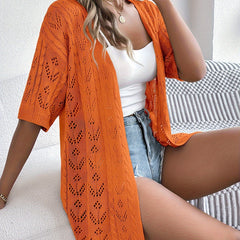 Emma knit cardigan for women by Christine Brewer, featuring a cozy, stylish top with a button-up design and ribbed cuffs.