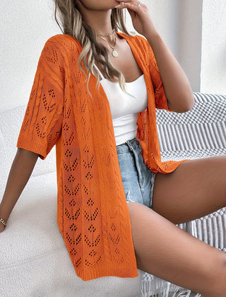 Emma knit cardigan for women by Christine Brewer, featuring a cozy, stylish top with a button-up design and ribbed cuffs.