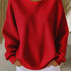 Women's knit sweater by Christine Brewer, featuring a cozy design with a round neckline and textured knit pattern.