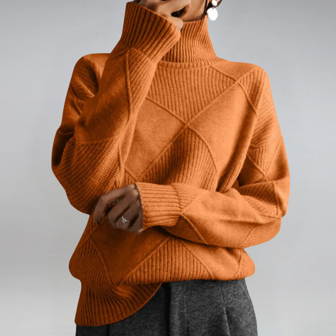 Women’s Margot turtleneck sweater by Christine Brewer, featuring a cozy knit design in a stylish, fitted silhouette.