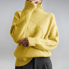 Christine Brewer Margot women's turtleneck sweater in cozy knit, featuring a high neckline and fitted style.