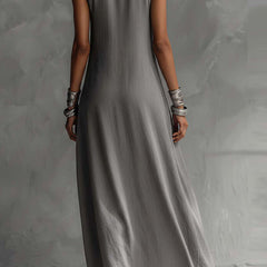 Color-blocked round neck sleeveless maxi dress with casual pockets by Christine Brewer, featuring a loose fit and vibrant design.