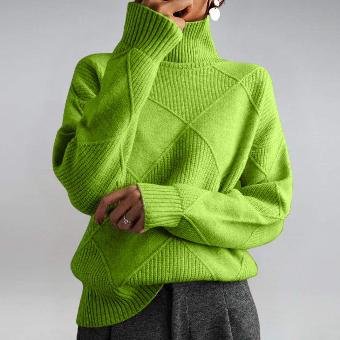 Christine Brewer Bella tailored turtleneck sweater, versatile and fitted, in a neutral color, styled for casual or office wear.