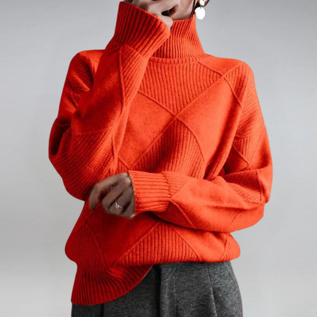 Christine Brewer Bella tailored versatile turtleneck sweater, showing a close-up of the soft, fitted fabric in a neutral color.