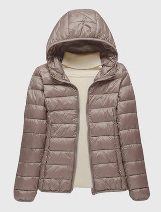 Christine Brewer Lily ultra-light quilted jacket in soft fabric, showcasing a sleek, stylish design with a stand collar and subtle quilting.