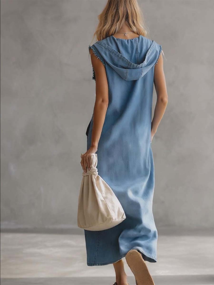 Blue denim V-neck midi dress by Christine Brewer featuring a casual style, with a fitted waist and knee-length hem.
