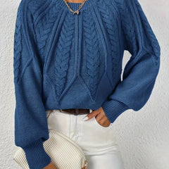 Pink knit sweater for women by Christine Brewer, featuring a cozy, textured design with a round neckline and long sleeves.