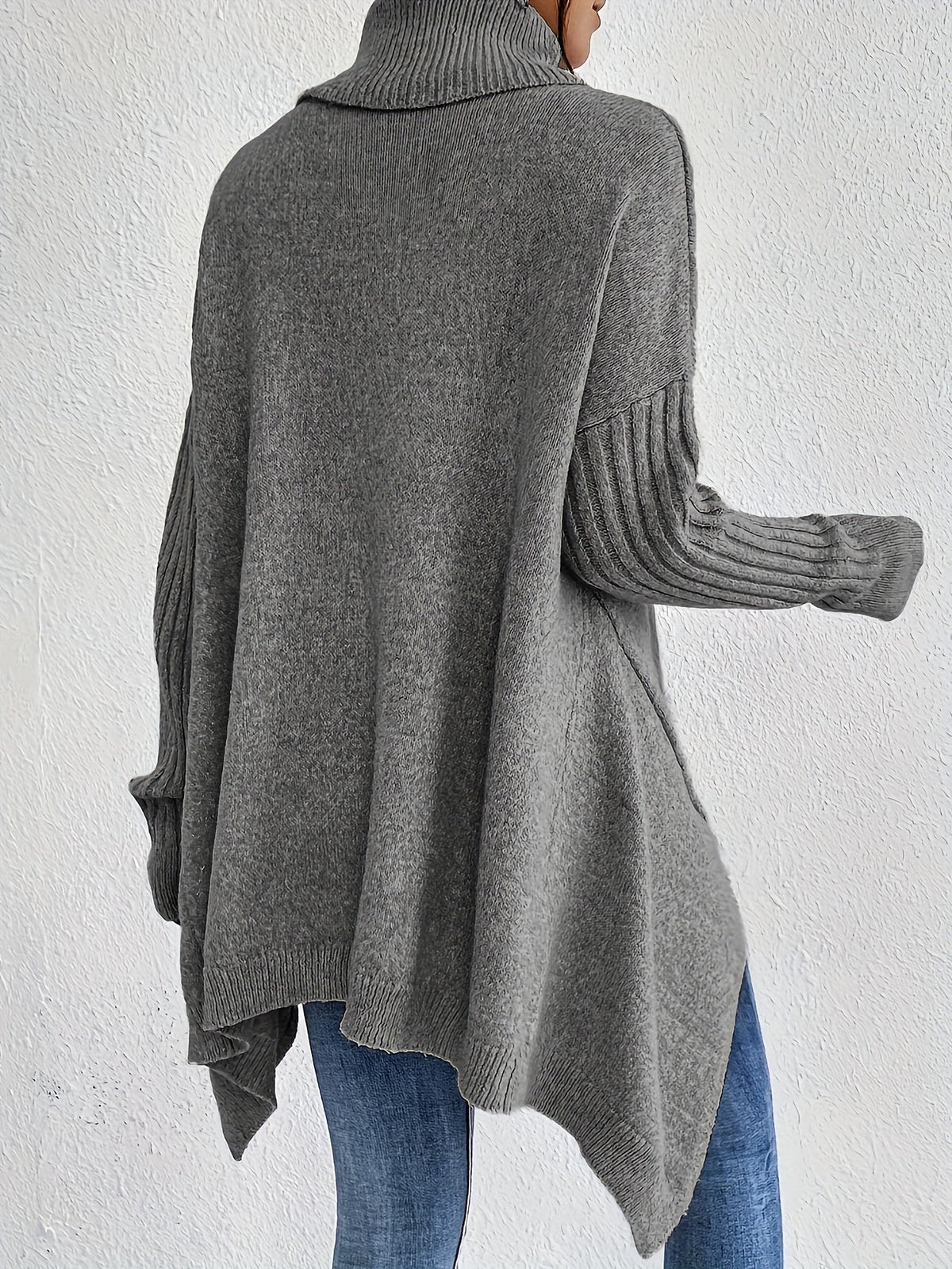 High-neck women's sweater by Christine Brewer, featuring a cozy knit design in a neutral color.