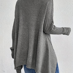 Cream high neck sweater for women by Christine Brewer, featuring a cozy, stylish design with a fitted silhouette.