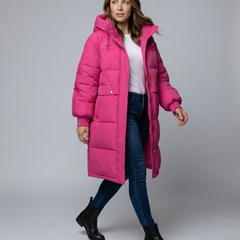Oversized pink puffer jacket for women by Christine Brewer featuring a rose design, full front view, warm winter outerwear.