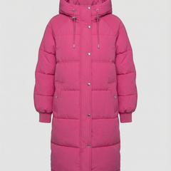Oversized pink puffer jacket for women by Christine Brewer, featuring a soft rose color and quilted design for warmth.