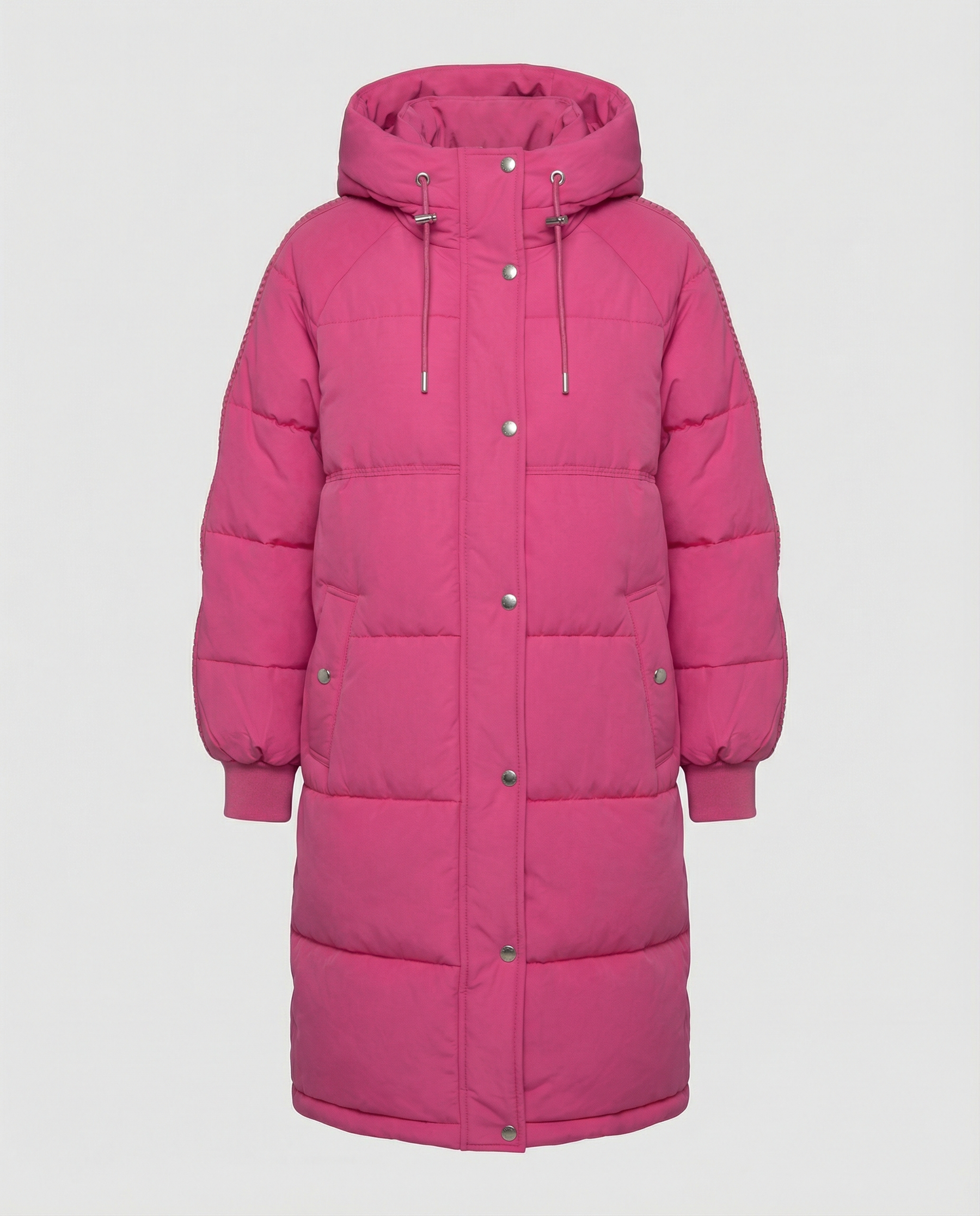 Oversized pink puffer jacket for women by Christine Brewer, featuring a soft rose color and quilted design for warmth.