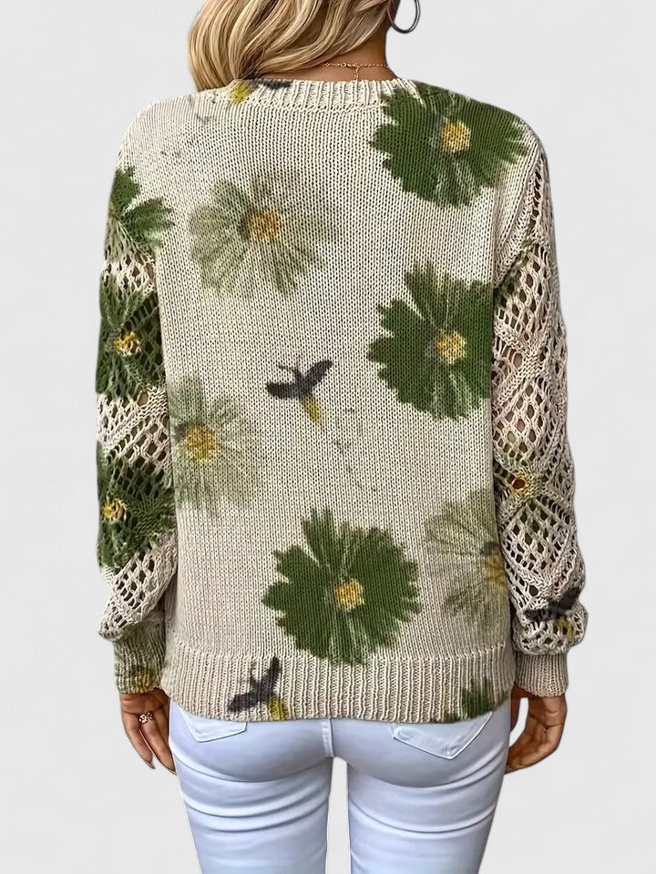 Whitney floral V-neck cardigan for women by Christine Brewer, featuring a colorful floral pattern and soft knit fabric.