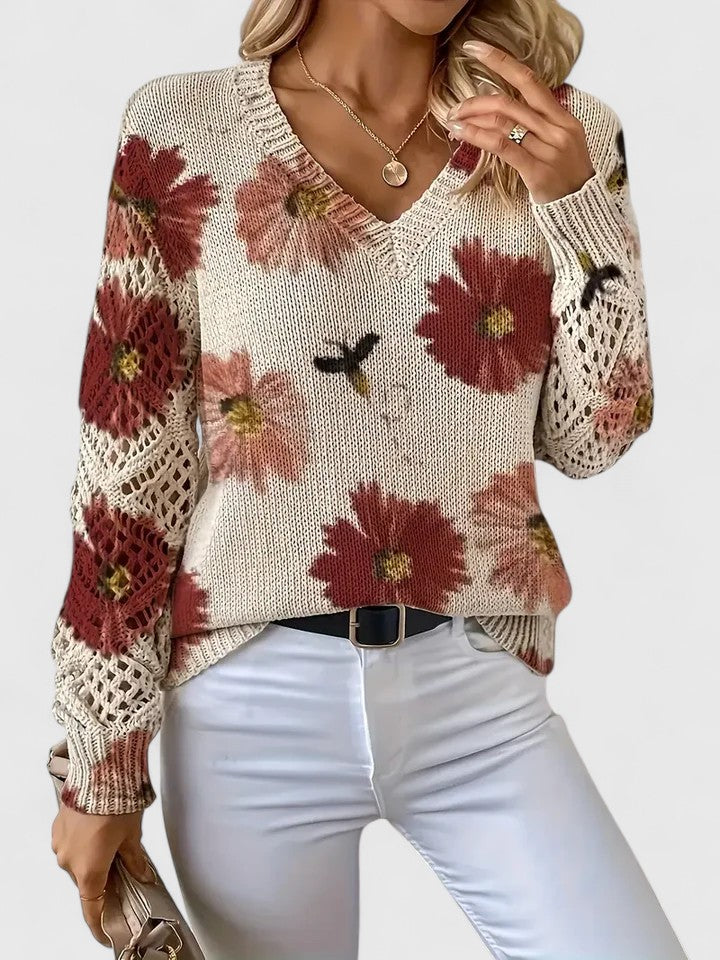 Floral V-neck cardigan for women by Christine Brewer, featuring colorful floral pattern and lightweight knit fabric.