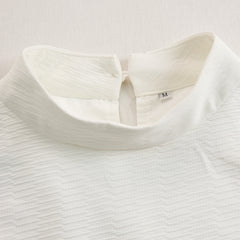 Cream textured lantern sleeve two-piece set for women featuring stylish pants by Christine Brewer, shown in the product image.