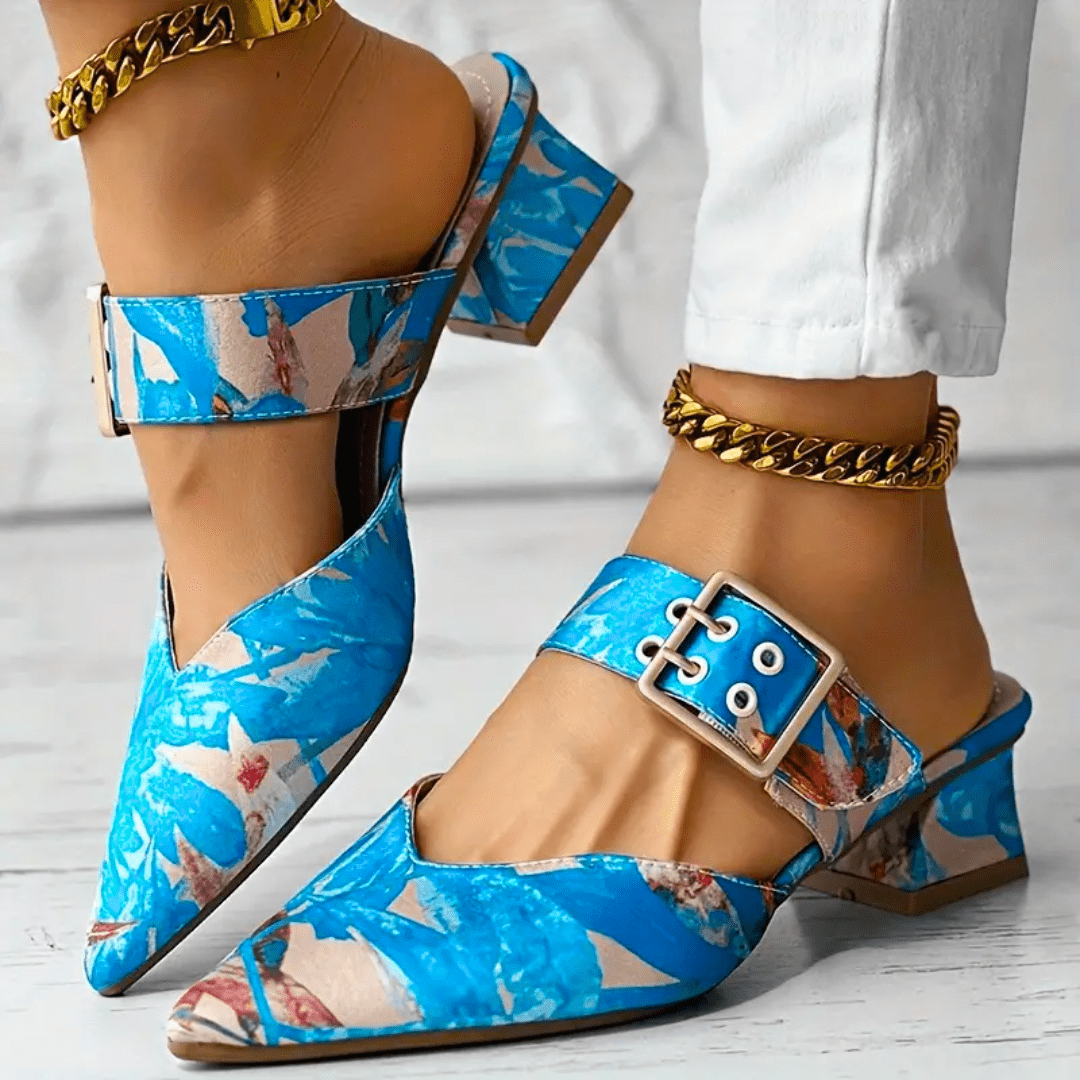 Bright rainbow-colored orthopedic women's heels by Christine Brewer with a comfortable, stylish design and supportive heel.