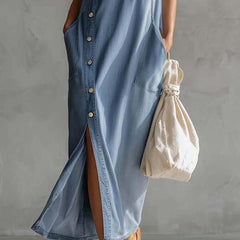 Blue denim V-neck midi dress by Christine Brewer, casual dress with a relaxed fit and stylish V-neck design.