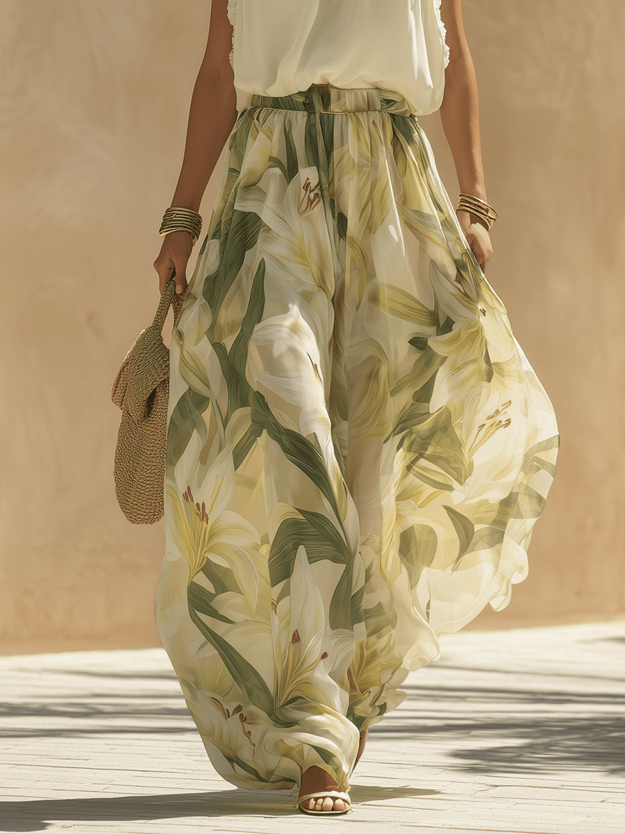 White flowing maxi dress for women by Christine Brewer, featuring a lightweight, elegant design with a relaxed fit.