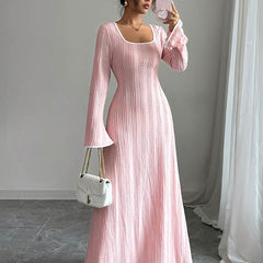 White Christine Brewer A-Line bodycon ribbed knit maxi dress with split joints and square neckline, displayed on a hanger.