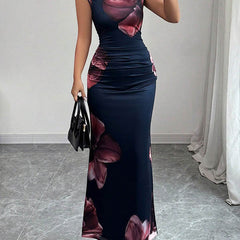 Christine Brewer bodycon sleeveless maxi dress with contrast color flower print and round neck, white floral design for elegant summer wear.