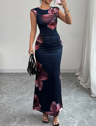 Christine Brewer bodycon sleeveless maxi dress with contrast color flower print and round neck, white floral design for elegant summer wear.